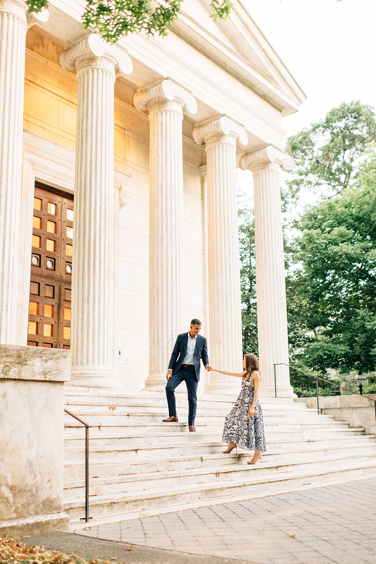Princeton University engagement photos with couple walking on campus